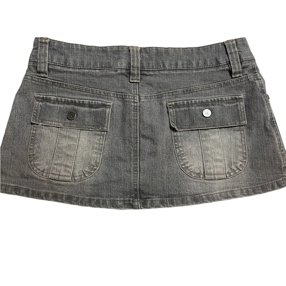 Y2k Grayish / tan stitching
denim mini skirt with pocket button. - Picture 2 of 5